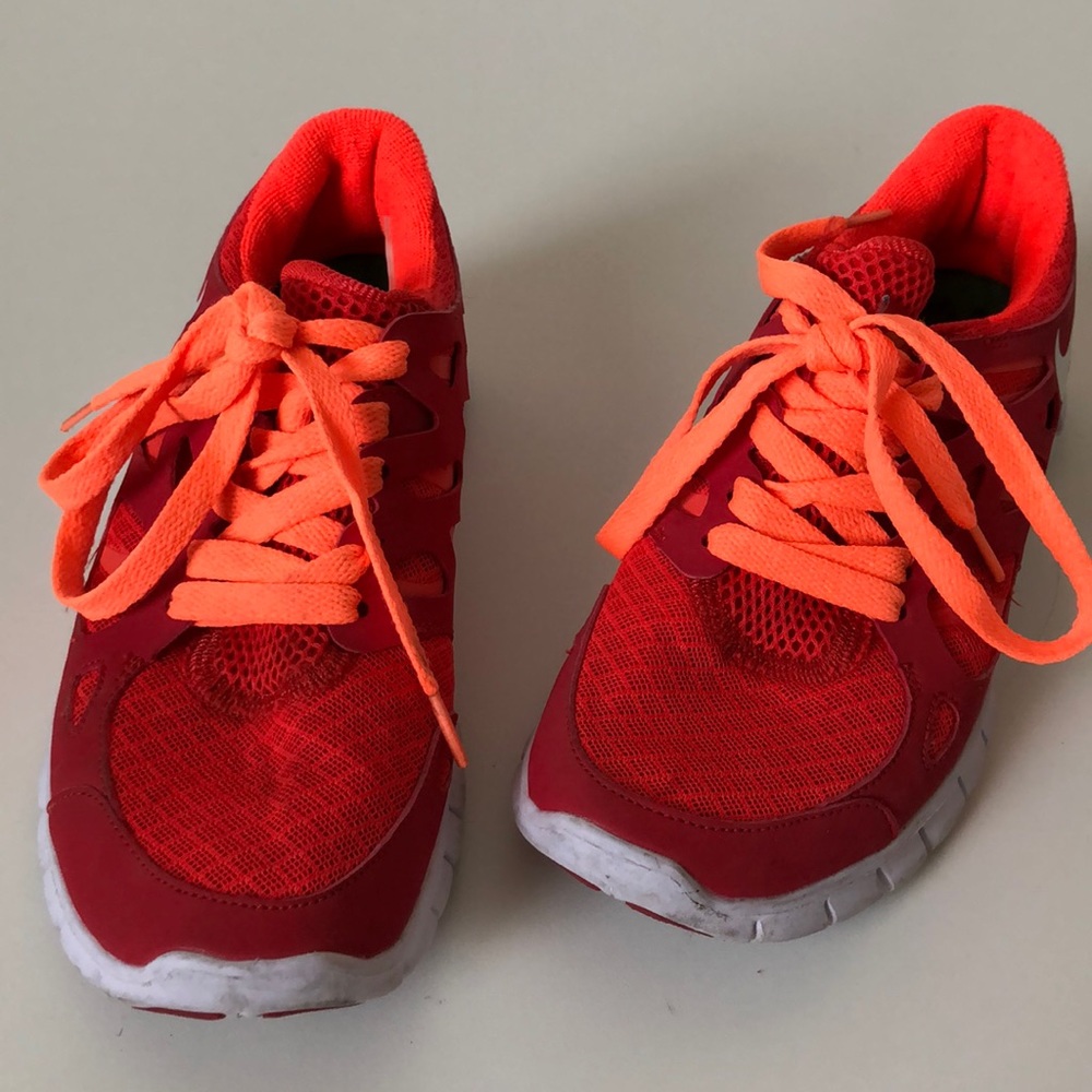 Orange Nike shoes